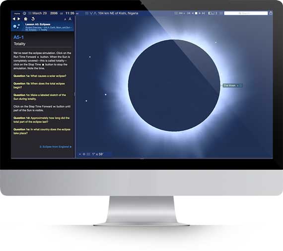 Apple iMac running Starry Night High School software showing a total eclipse simulation